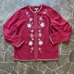 Red cardigan with snow flakes
